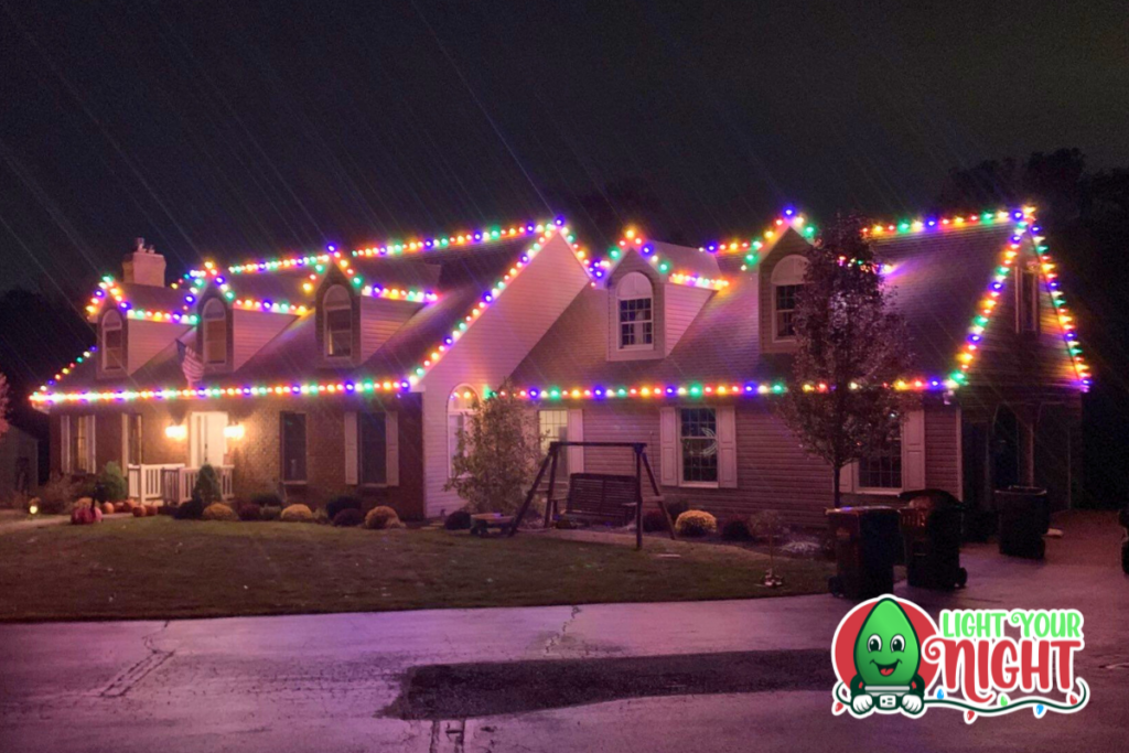 Multi-colored holiday lights installed by Light Your Night